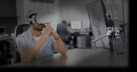 Leaning dev wearing striped shirt white VR headset viewing 3D robot hand render, Stock Photos