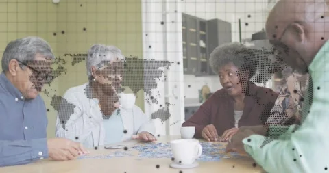 Leaning forward examining pieces, four friends piecing jigsaw puzzle with coffee Stock Footage 317834814