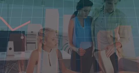 Leaning professionals analyzing data in notebook and on monitors in open office, Stock Photos