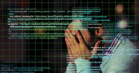 Leaning programmer studying code at office desk, with keyboard and code grid  Stock Photos