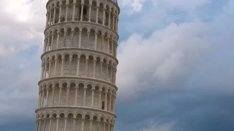 Leaning tower of pisa showing different perspectives and cloudy sky Stock Footage 318655393