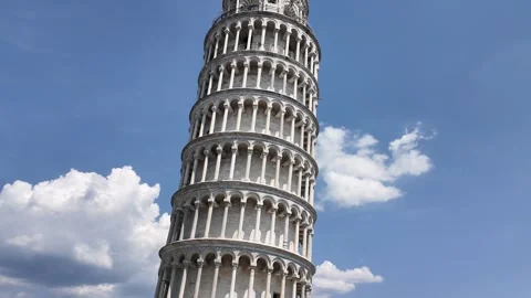 Leaning Tower of Pisa tilting against blue sky, Italy Stock Footage 346151756
