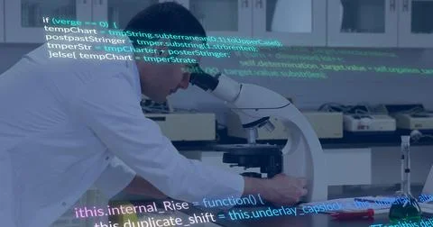 Leaning white coat man using compound microscope on lab bench flask adjusting Stock Photos