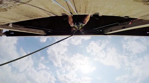 Leap forward facing view from below Stock Footage 68070256