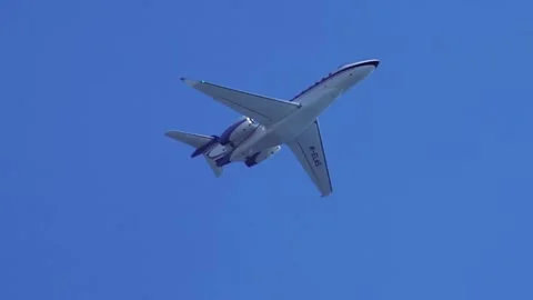 Learjet aircraft passing above Video stock 136448246