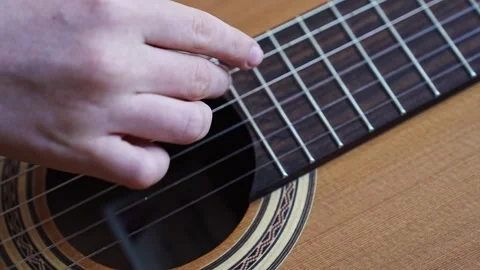 Learn basic guitar chords with simple hand positions 스톡 동영상 332469661
