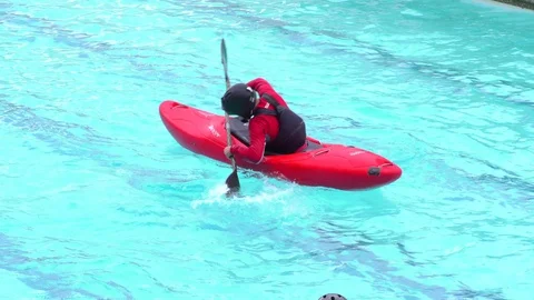 Learn basic kayak self rescue techniques in Banos,Ecuador,including consecutive Video stock 128454141