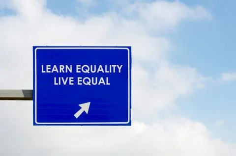 Learn Equality Live Equal words displayed on blue road sign Stock Photos