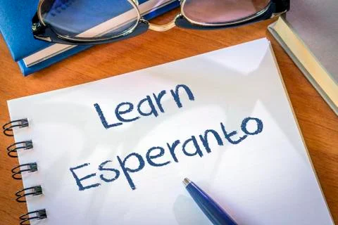 Learn Esperanto written in a notepad. Education concept.. Stock Photos