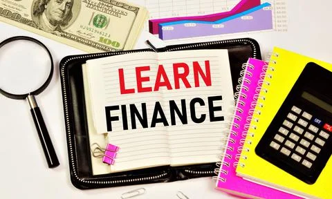 Learn finance. A text label in the planning notebook. Stock Photos