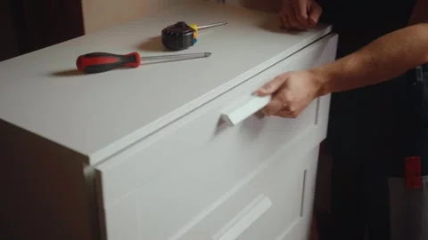 Learn how to create a stylish and functional drawer for your home organization Stock Footage 294912372