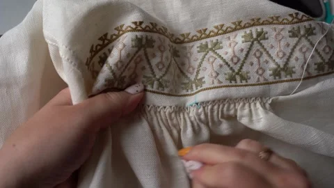 Learn how to sew decorative stitching on fabric in a simple step-by-step way Stock Footage 329559839