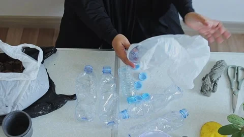 Learn how to upcycle plastic bottles into creative crafts with easy DIY Stock Footage 343729203