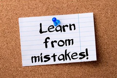Learn from mistakes! - teared note paper pinned on bulletin board Stock Photos
