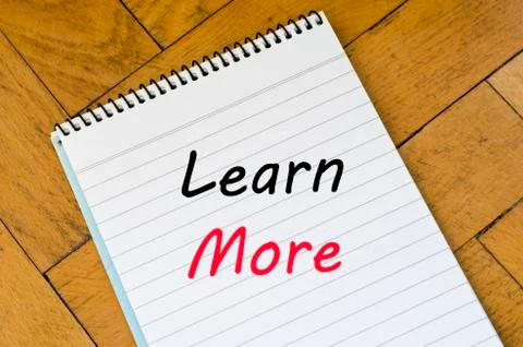 Learn more text concept on notebook Stock Photos