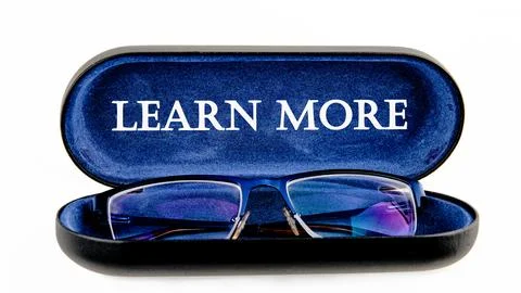 LEARN MORE text on the glasses case on a white background Stock Photos