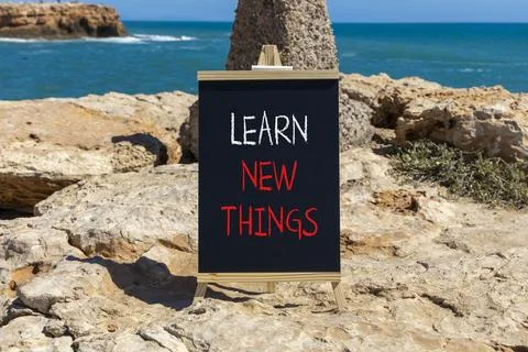 Learn new things symbol. Concept words Learn new things on beautiful black .. Stock-Fotos