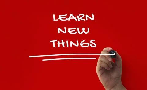 Learn new things text written on red cover background. Inspirational concept Stock Photos