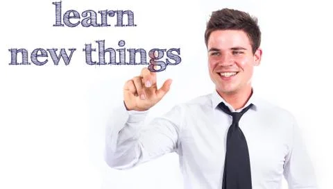 Learn new things - Young smiling businessman touching text Stock Photos