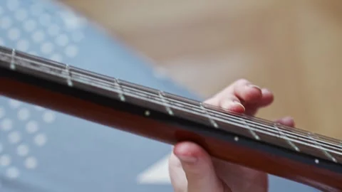 Learn to play guitar chords with simple finger placements 스톡 동영상 332467917