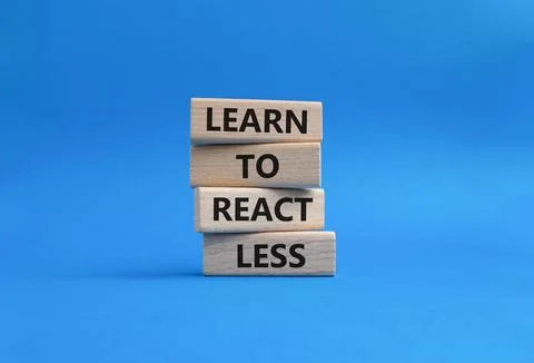 Learn to react Less symbol. Wooden blocks with words Learn to react Less. B.. Foto stock