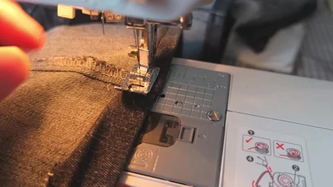 Learn sewing techniques for fabric using a sewing machine at home Stock Footage 338406321