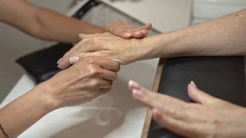 Learn Step by Step How to Do a Classic French Manicure at the Salon Stockbeeldmateriaal 323099701