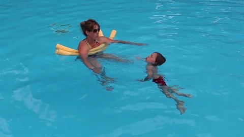 Learn to swim Stock Footage 83576836