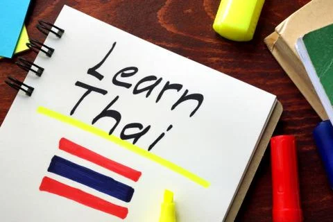 Learn thai written in a notepad. Stock Photos