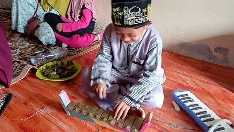 Learn traditional musical instruments Stock Footage 221871172