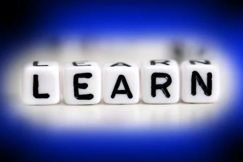 Learn word made from plastic beads on blue frame Fotos Stock