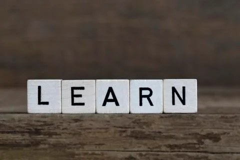 Learn, written in cubes Stock Photos