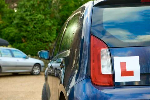 Learner Driver Sign on the Back of Blue Car Stock Photos