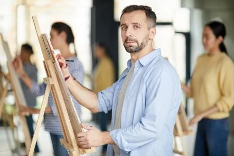 Learner by easel Stock Photos