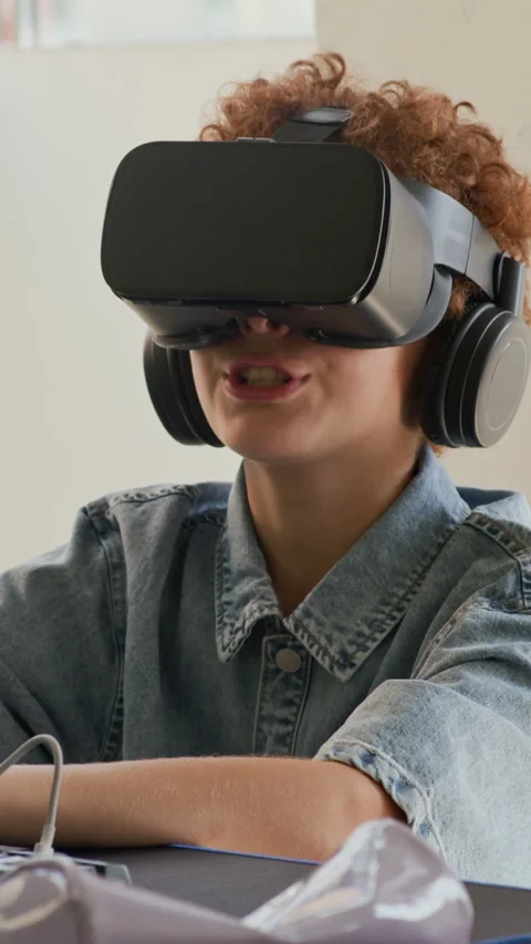 Learner with Virtual Reality Headset Commenting Immersive Experience Stock Footage 316483275