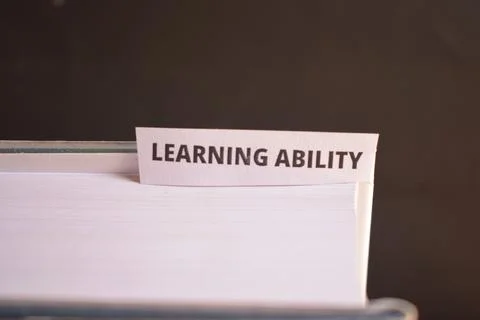 Learning Ability Bookmark Inserted in Book Representing Education and Skill.. Fotos Stock