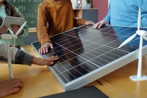 Learning About Renewable Energy in Classroom Setting Stock Photos