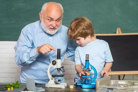 Learning and education concept. Old teacher. Biology experiment. Biotechnology Stock Photos