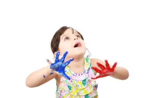 Learning and play themed image of a little girl with hands painted Stock Photos