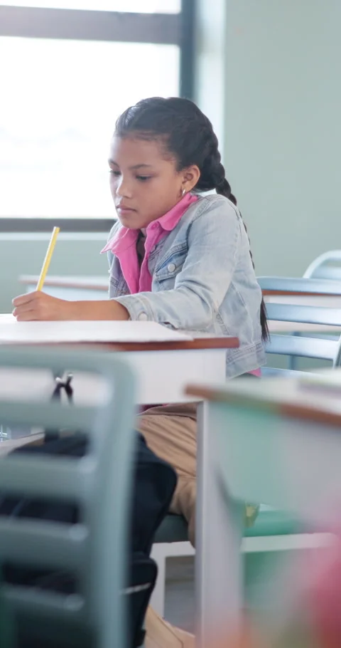 Learning, child and writing test in classroom, development and knowledge with Stock Footage 335906777