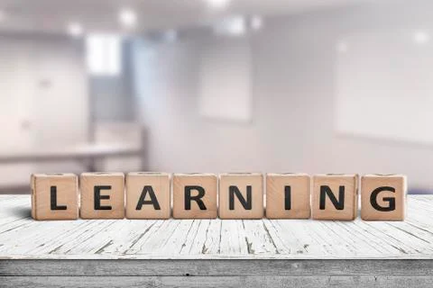 Learning in a classroom with a sign Stock Photos