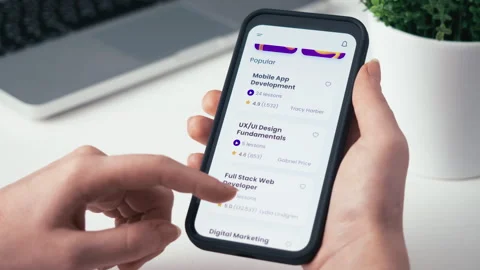 Learning to code online. Checking full stack web development online course using Stock Footage 260401583