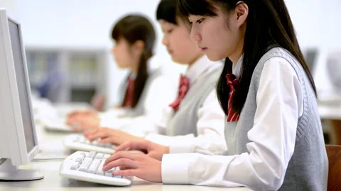 Learning with a Computer: A Female Student's Journey Stock Footage 332541448