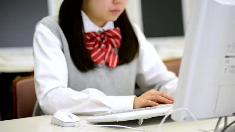 Learning with a Computer: A Female Student's Journey Stock Footage 332541542