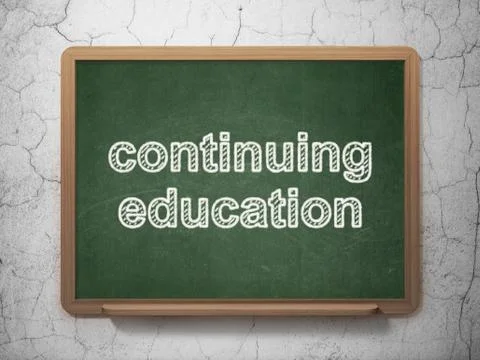 Learning concept: Continuing Education on chalkboard background Illustrazione stock