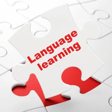 Learning concept: Language Learning on puzzle background Illustrazione stock