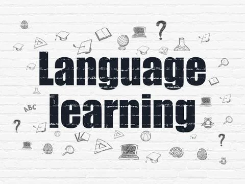 Learning concept: Language Learning on wall background Ilustración de archivo
