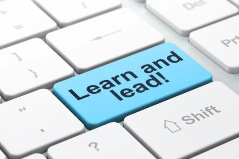 Learning concept: Learn and Lead! on computer keyboard background Stockillustratie