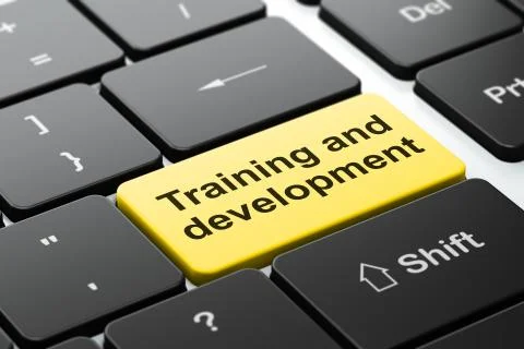 Learning concept: Training and Development on computer keyboard background Illustrazione stock