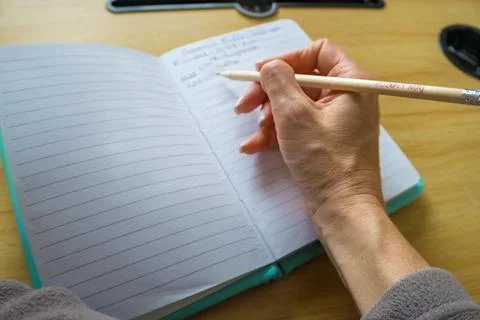 Learning, drawing education or studying with book. for creative art in notebook Stock Photos